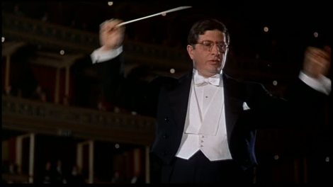 Bernard Herrmann in Alfred Hitchcock’s “The Man Who Knew Too Much.” Courtesy of Universal Pictures.